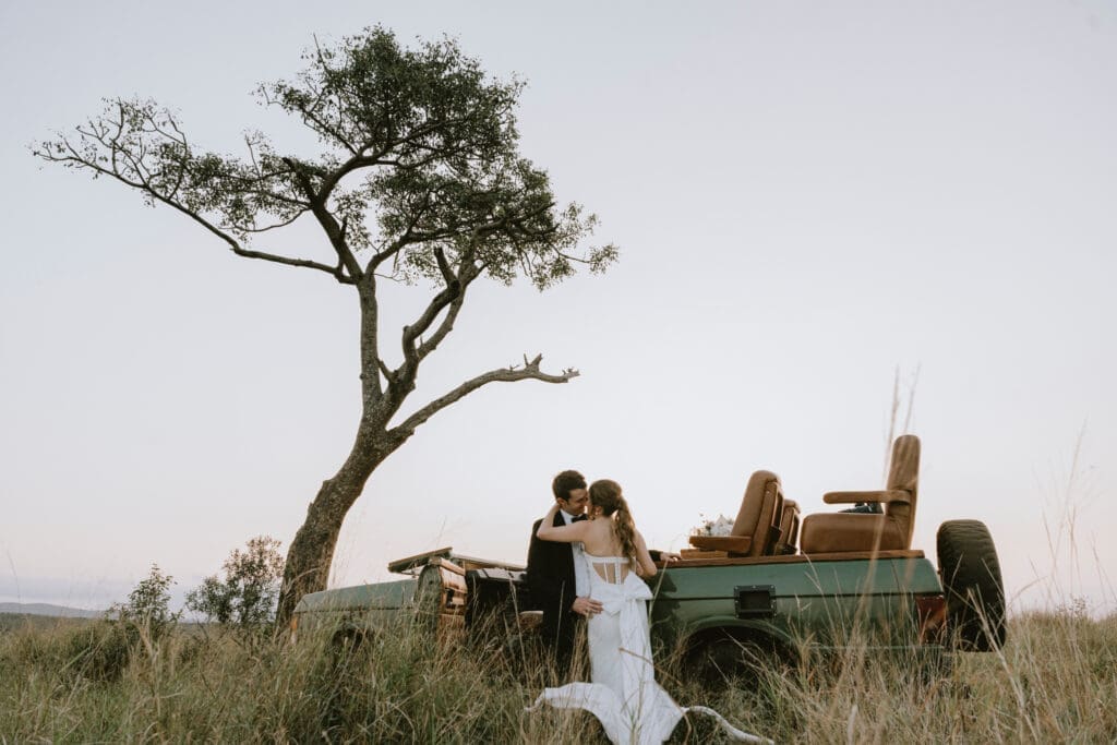 Newlyweds on safari drive at Bayala Private Safari Lodge