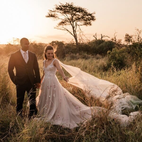 Bride and groom at sunset in beautiful bush landscape