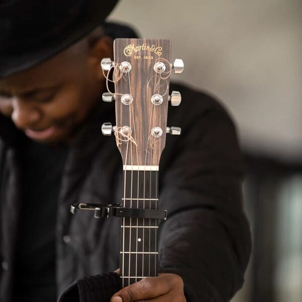 Musician holding guitar