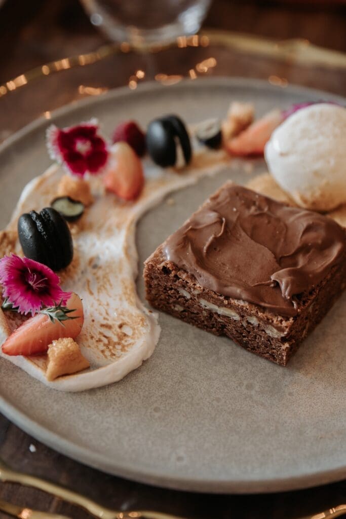 Delicious chocolate brownie with pretty garnish