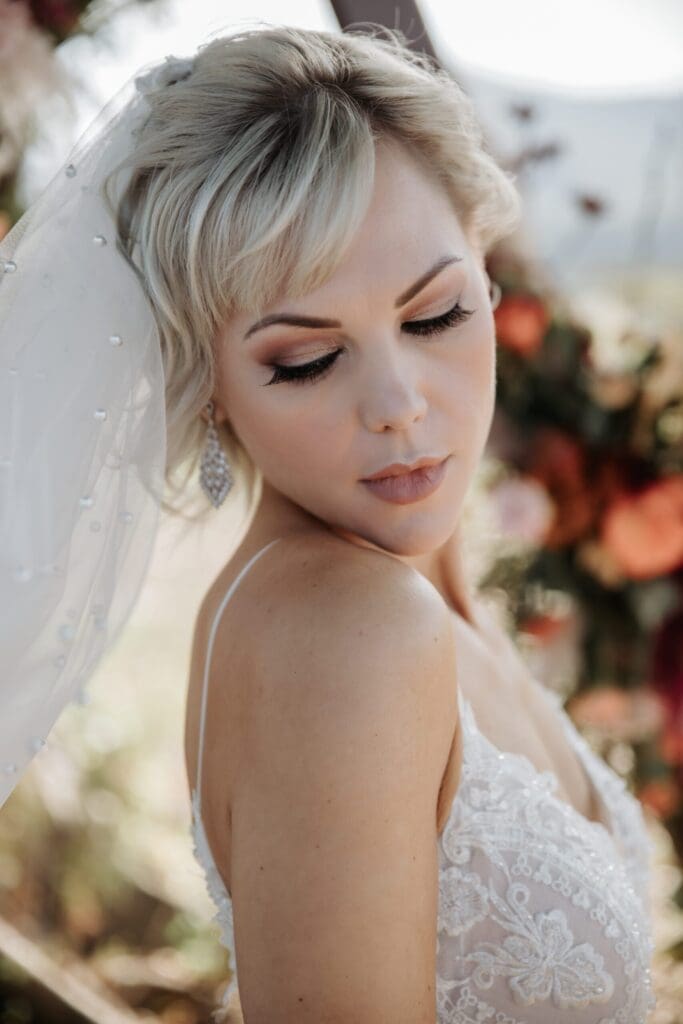 short haired blonde bride with natural looking eye makeup