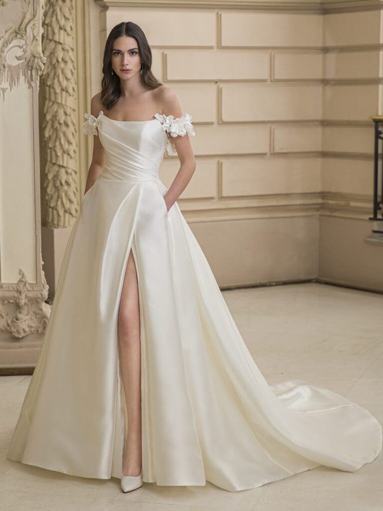 Woman wearing wedding dress with high slit