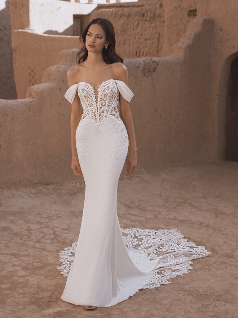 Trumpet styled off the shoulder wedding gown with lace detailing