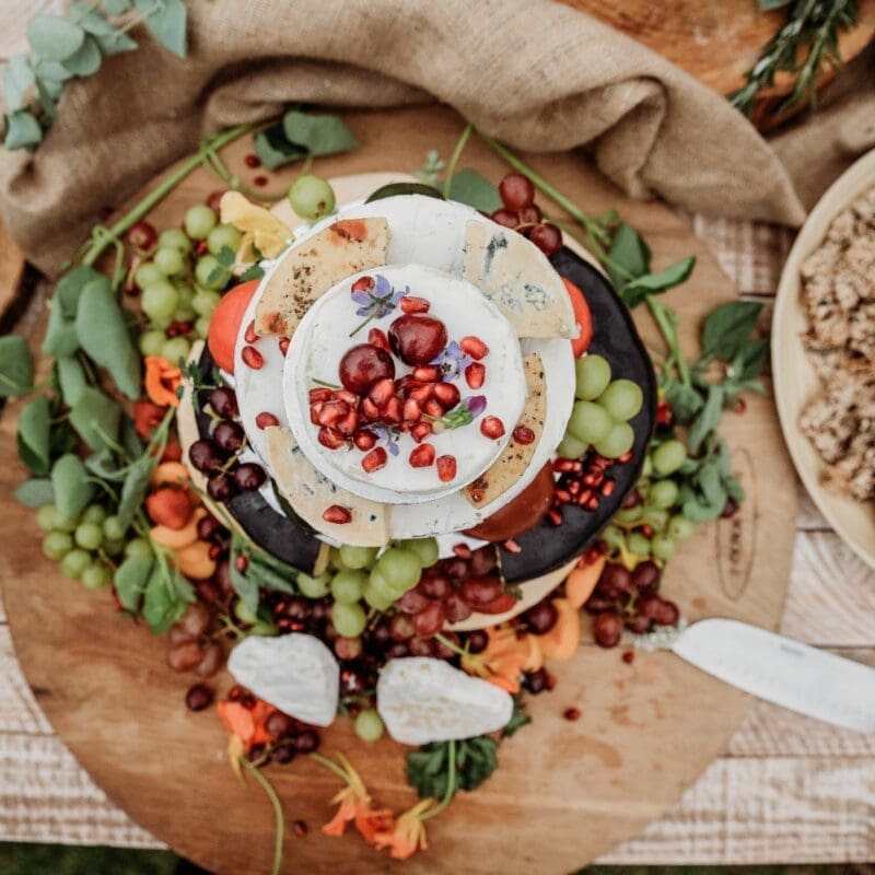Bright and colourful cheese board at wedding