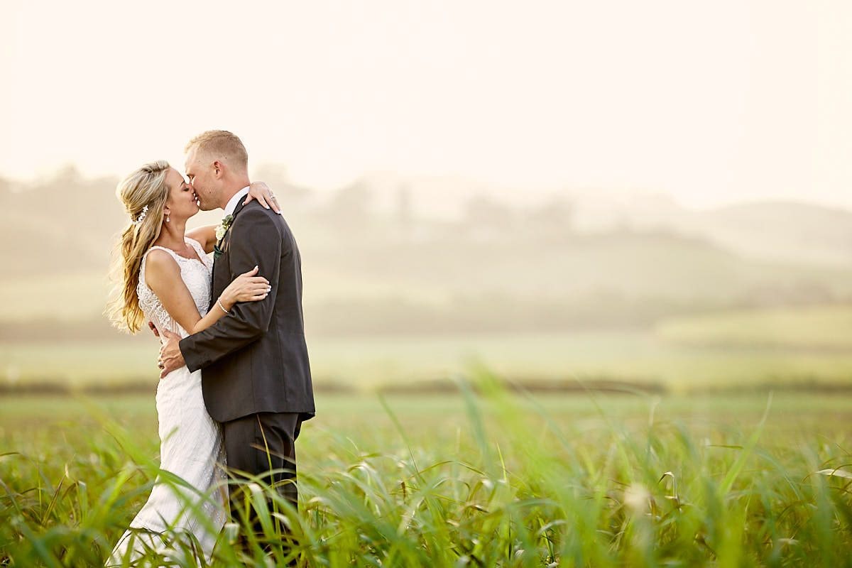 Bridal couple about to kiss