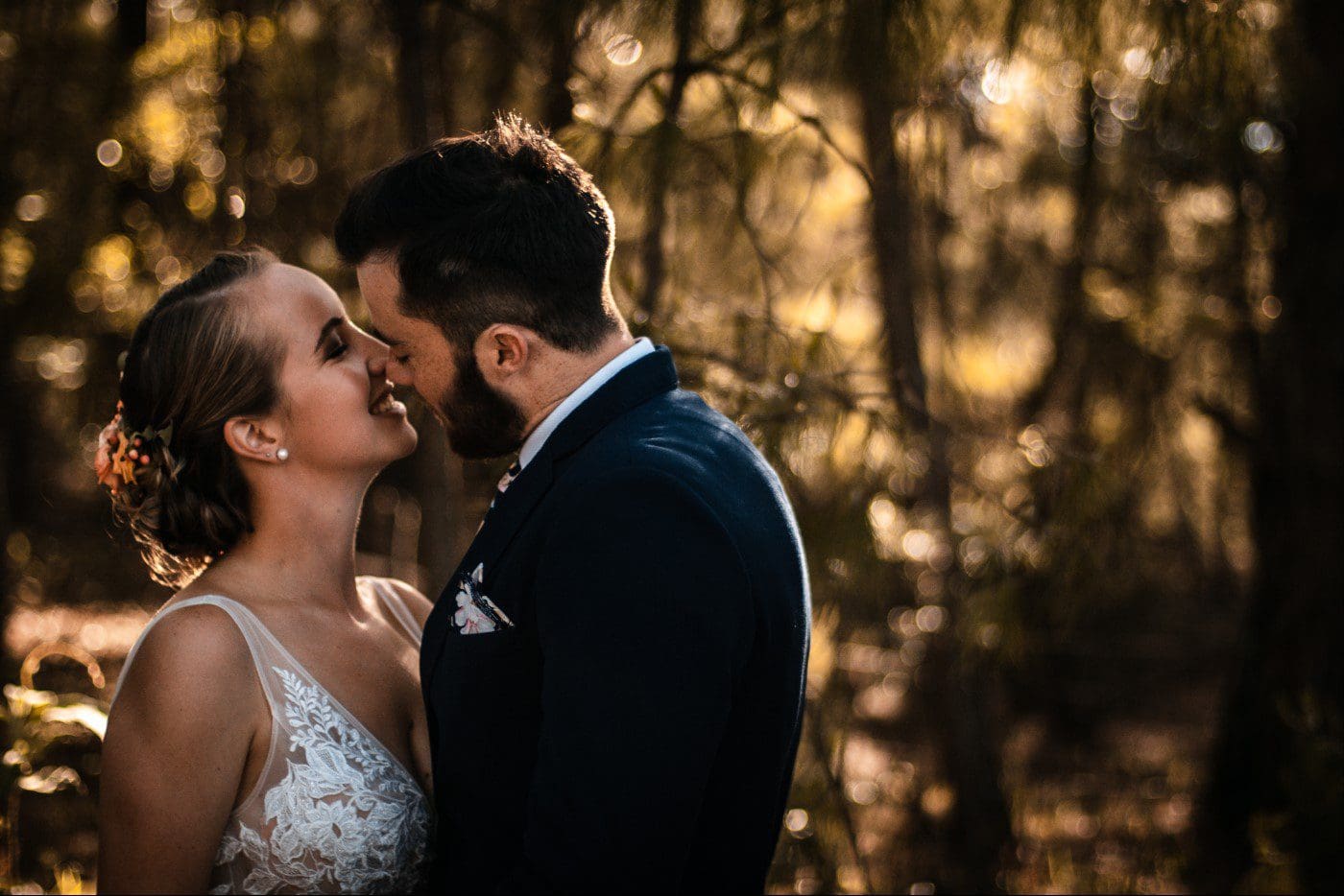 Bride and groom almost kissing