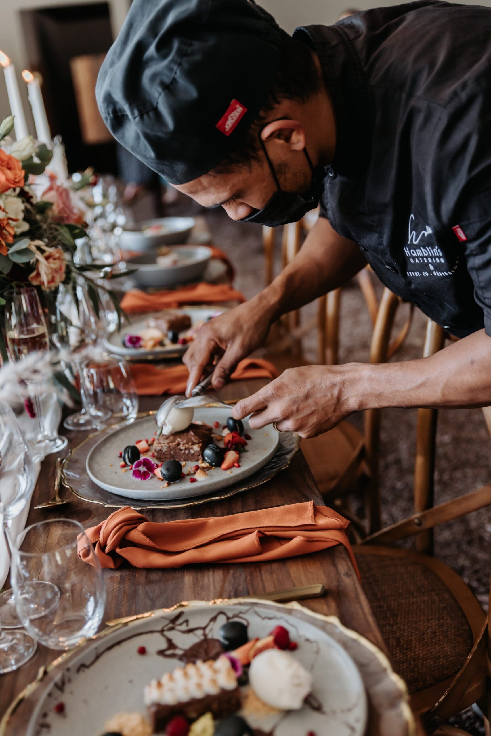 Catering team plating food