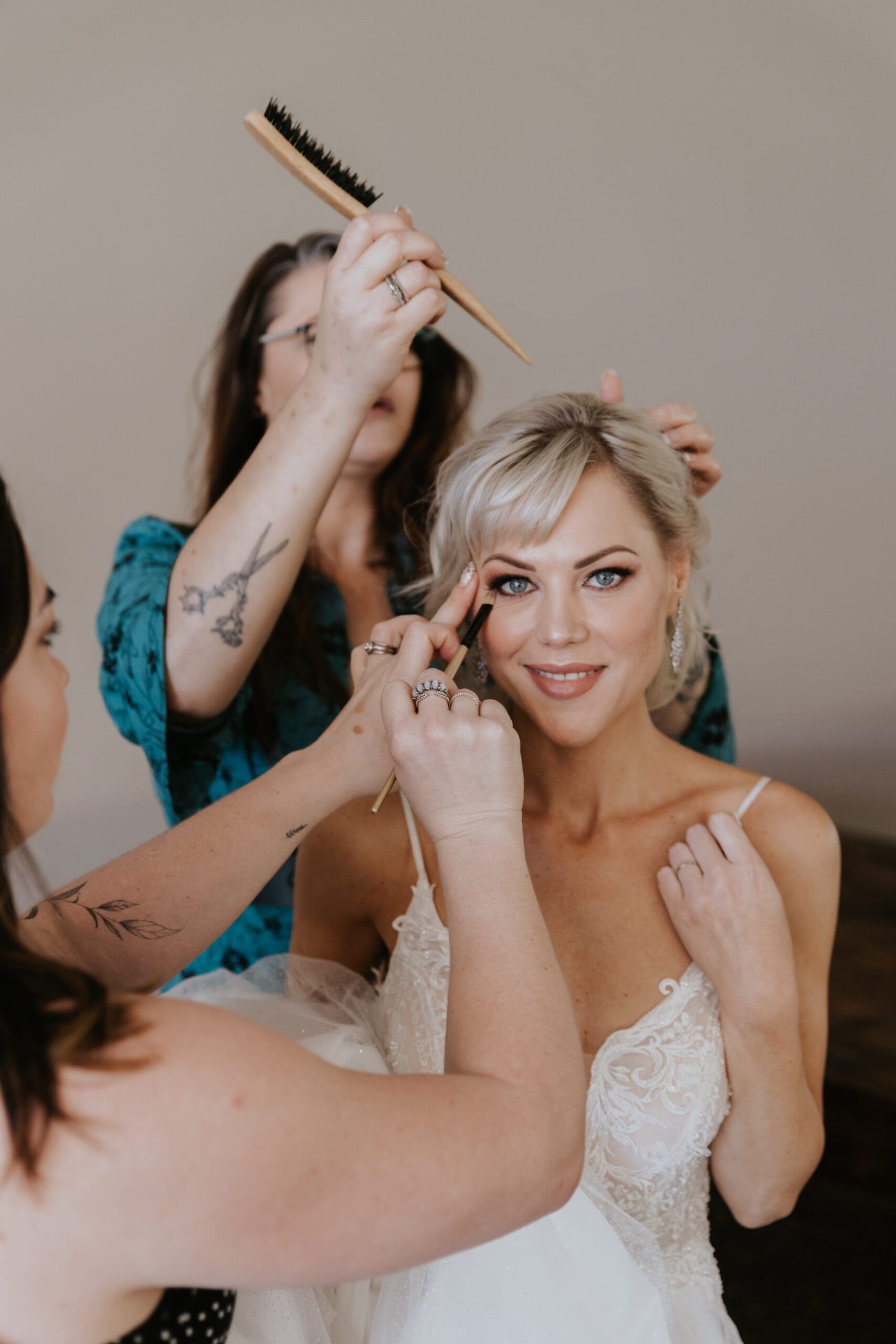 Short blonde bridal hairstyle and makeup