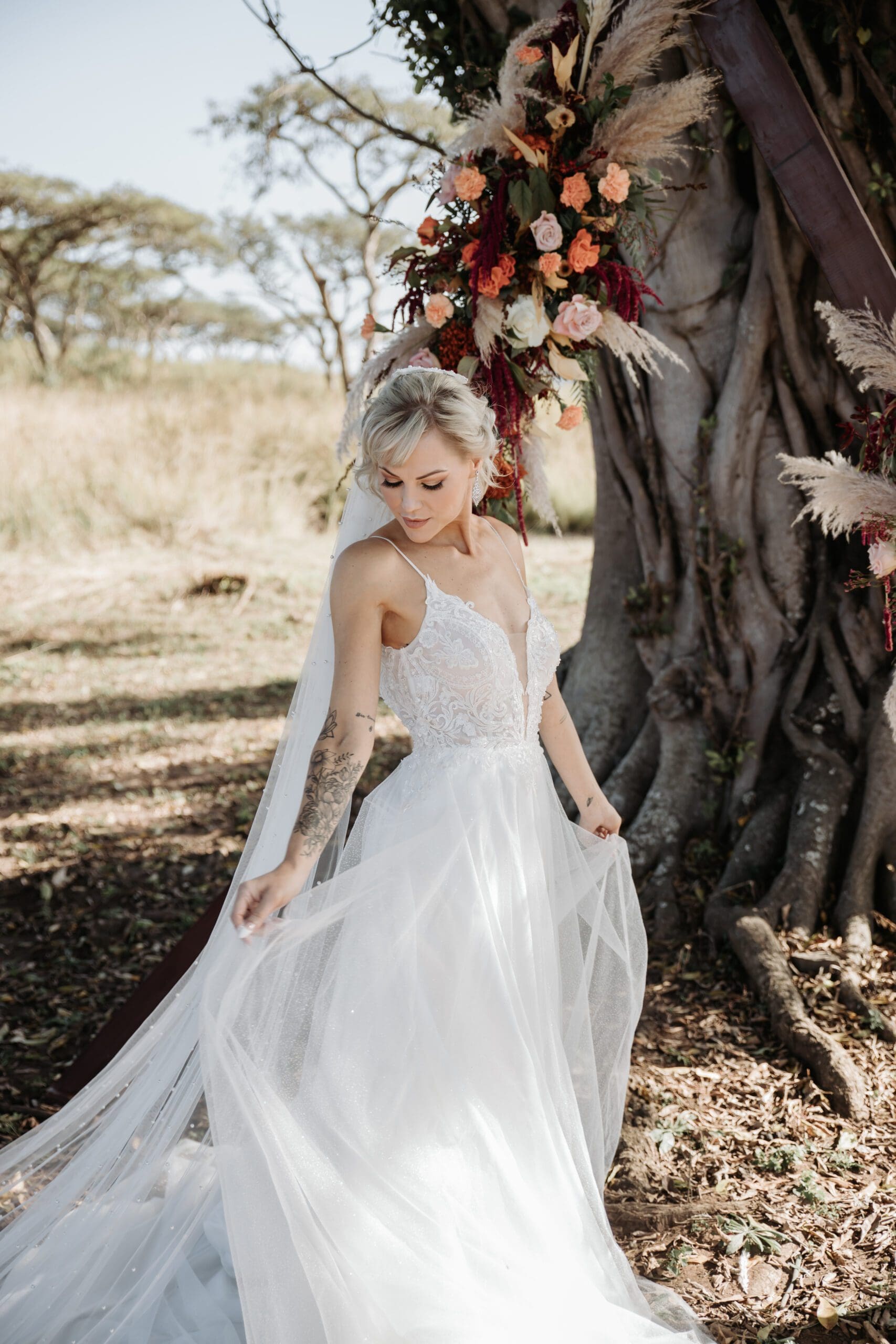 Deep V wedding dress and pearl veil