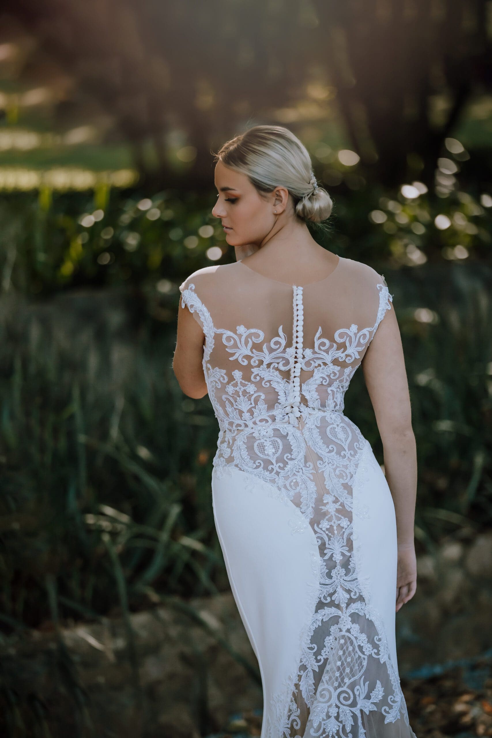 Sexy lace details and cut away at back of wedding dress