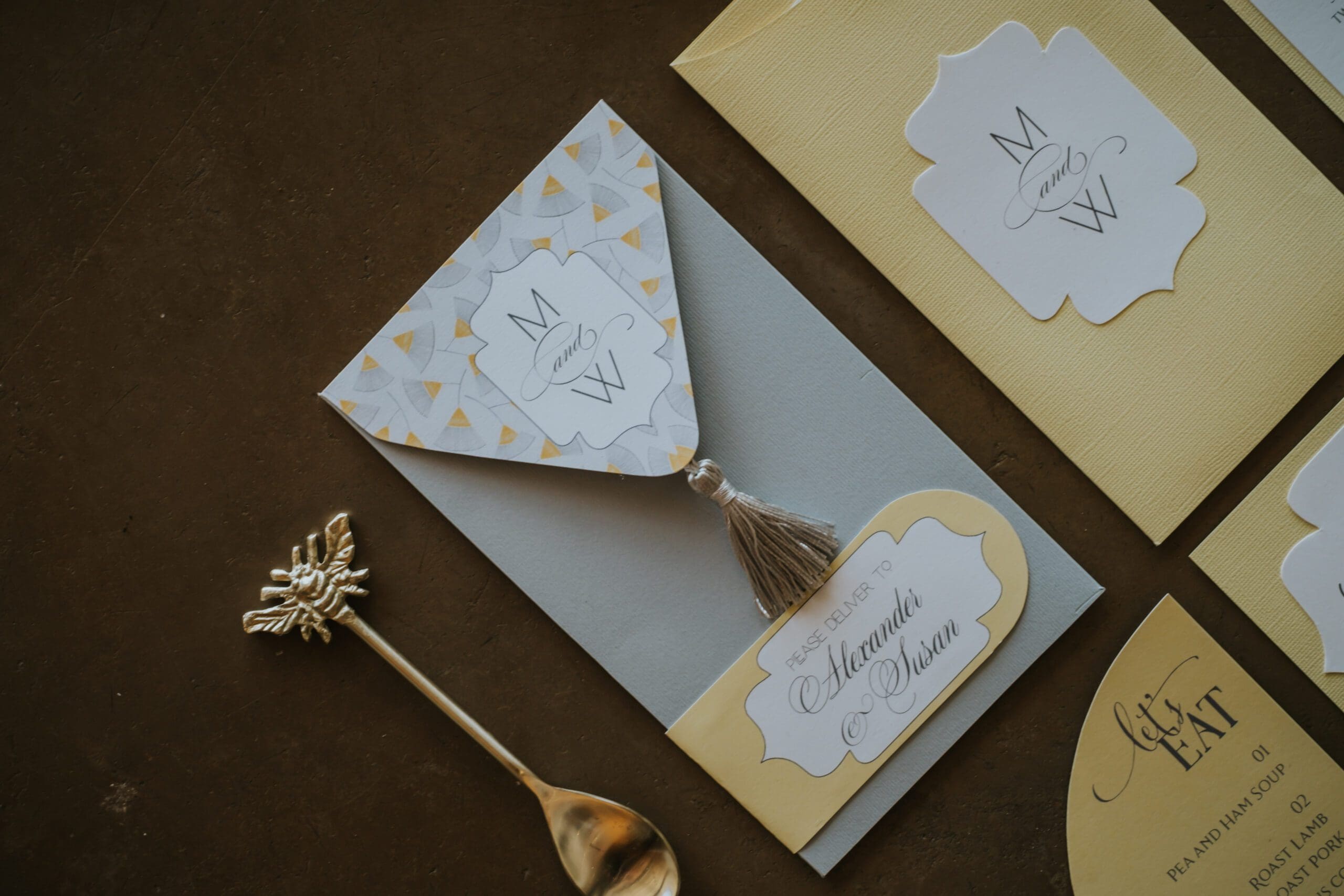 Yellow and grey stationery with tassel detail