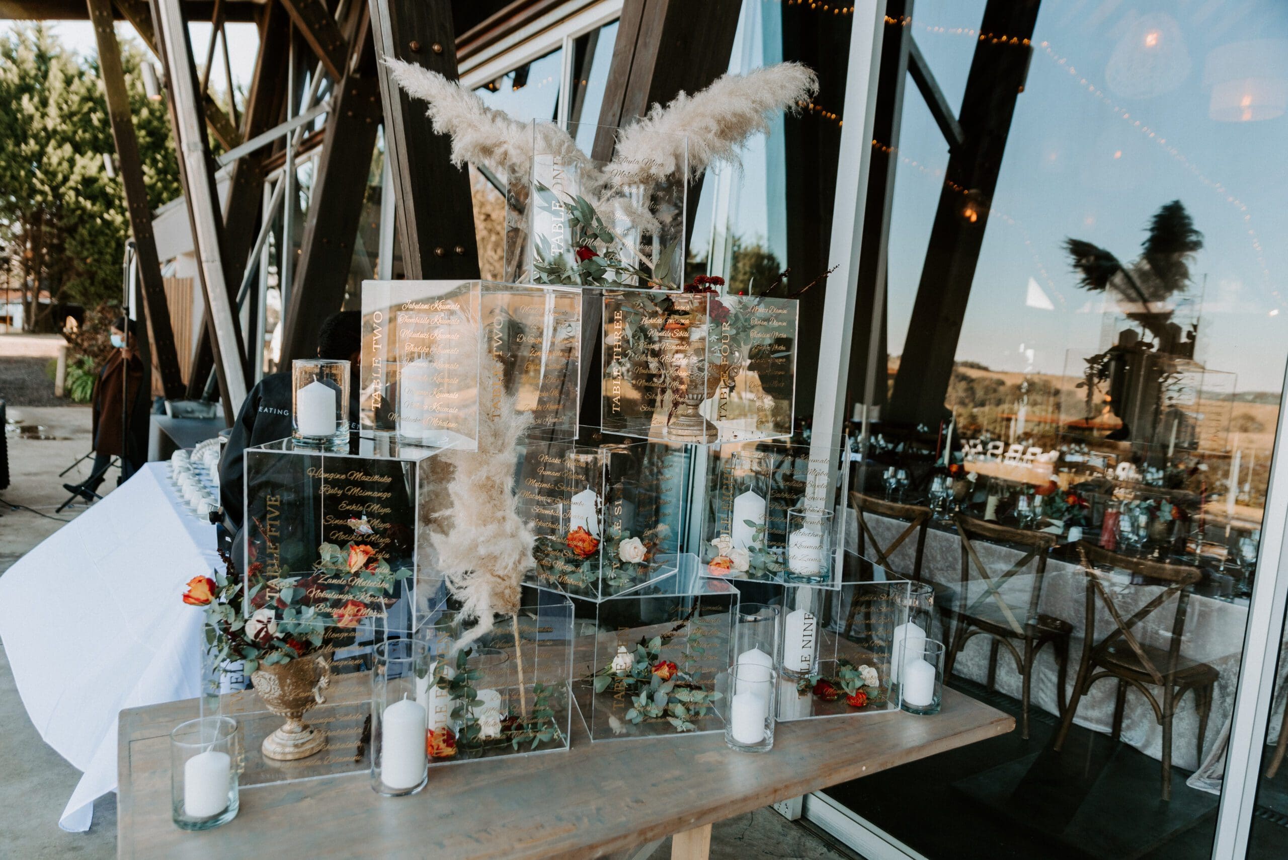 Seating plan printed on gold vinyl and applied to perspex boxes