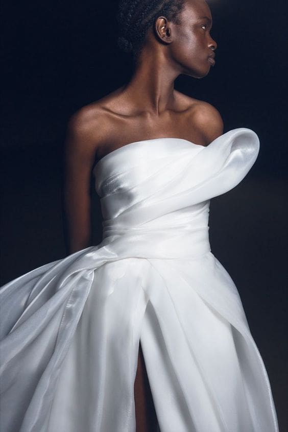 Voluminous off the shoulder white wedding dress with slit