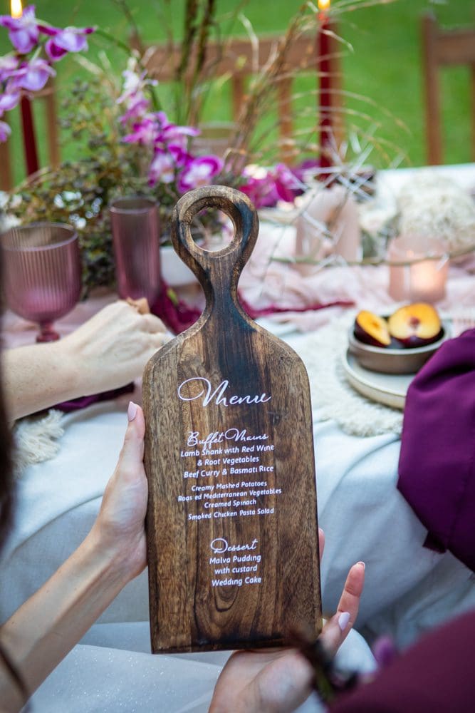 Unusual wedding Menu on wooden chopping board