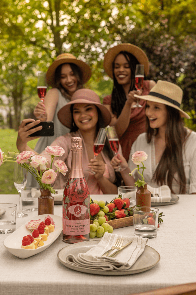 Robertson-Winery-Summer-Sparkling--ine-42 Group of women drinking sparkling wine and taking selfies