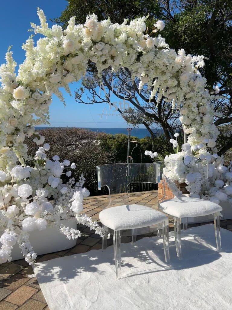 All white round floral arch at The Lazy Moose