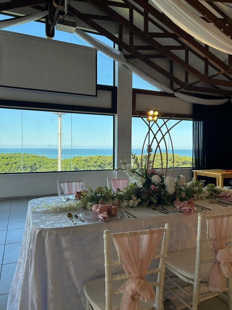 White and light pink decorated table at The Lazy Moose