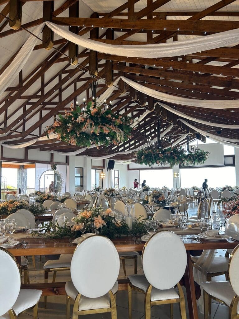 View of wedding table decor and draping at The Lazy Moose
