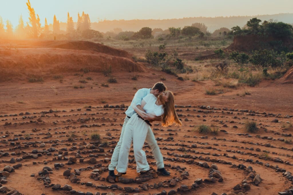Couple kissing in red dessert