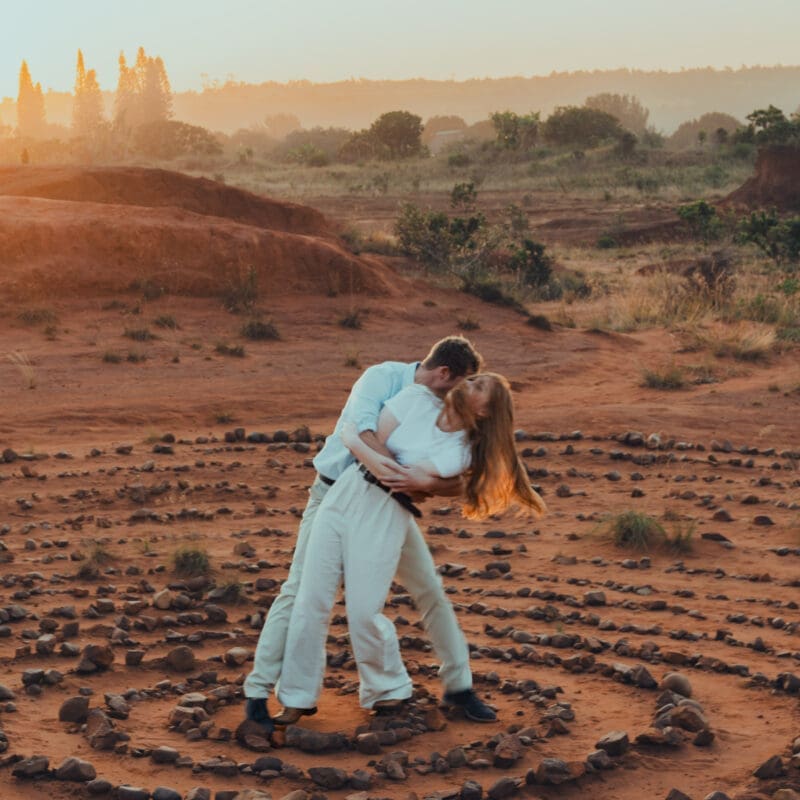 Couple kissing in red dessert