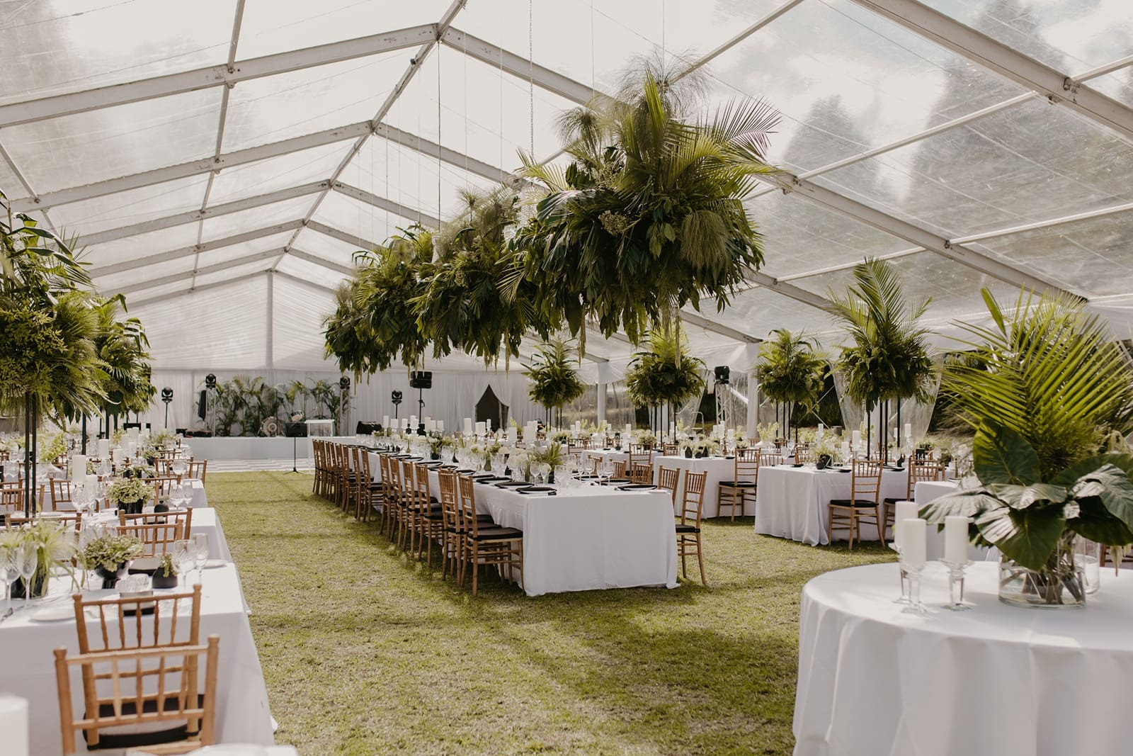Inside view of clear marquee wedding reception at Harrington House