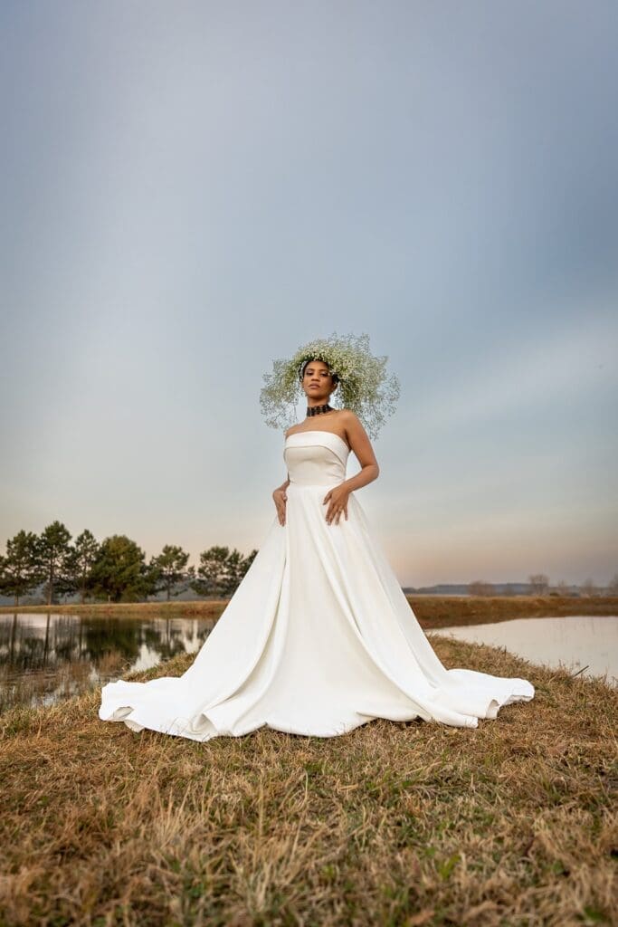 Bride standing confidently on lawn at Highgate Wine Estate