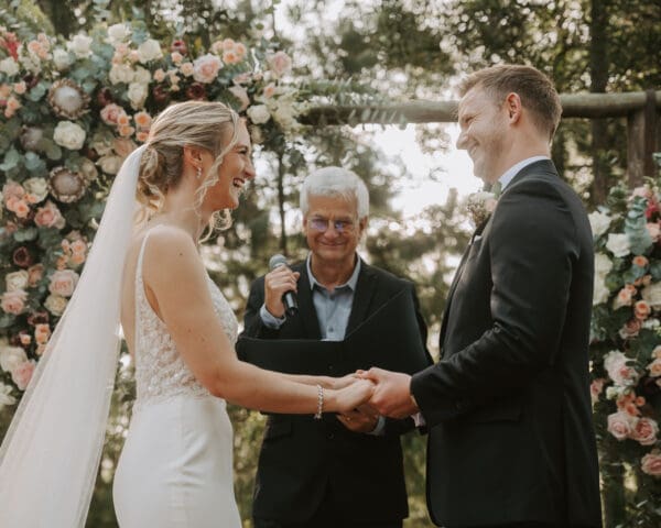 Bride and groom standing together during ceremony officiated by Jonathan Payne, The Wedding Celebrant