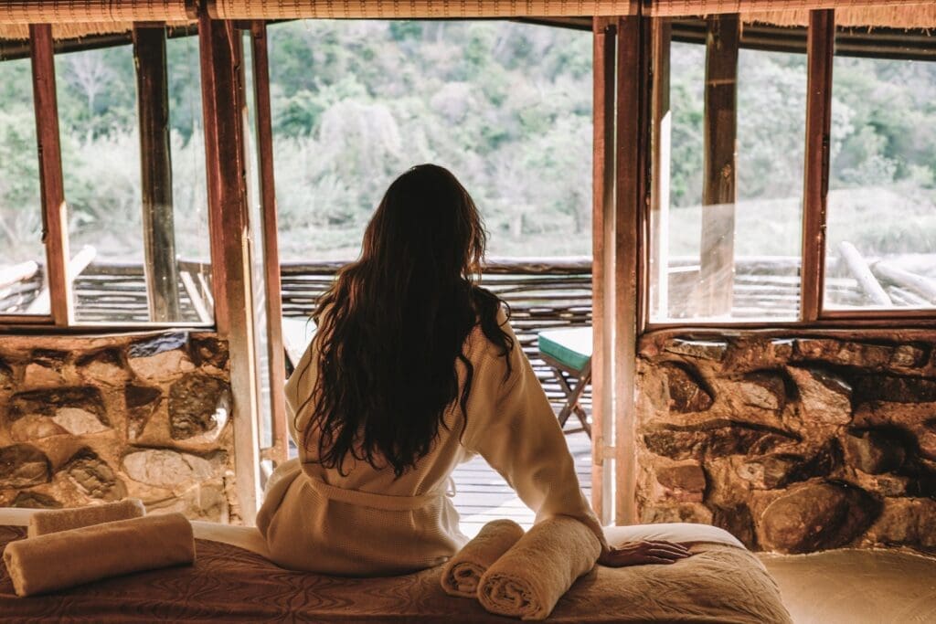 Bride sitting in room at Duma Manzi Eco Lodge & Spa