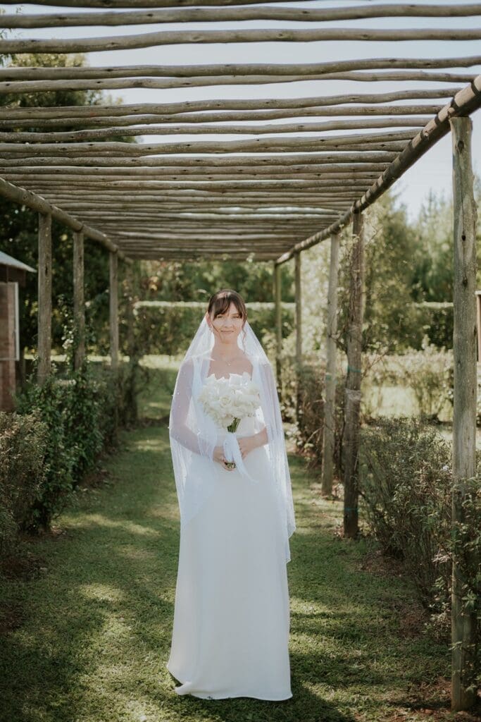 Bride standing in vineyards at Highgate Wine Estate