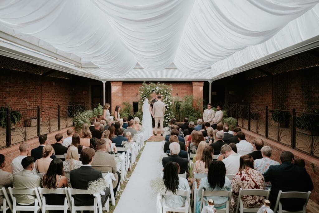 Wedding ceremony in the Atrium at Highgate Wine Estate