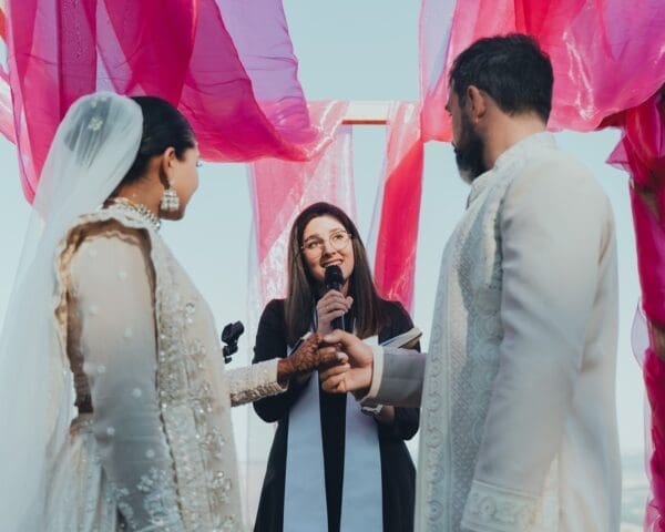Rev. Alice officiating wedding ceremony at Indian Wedding
